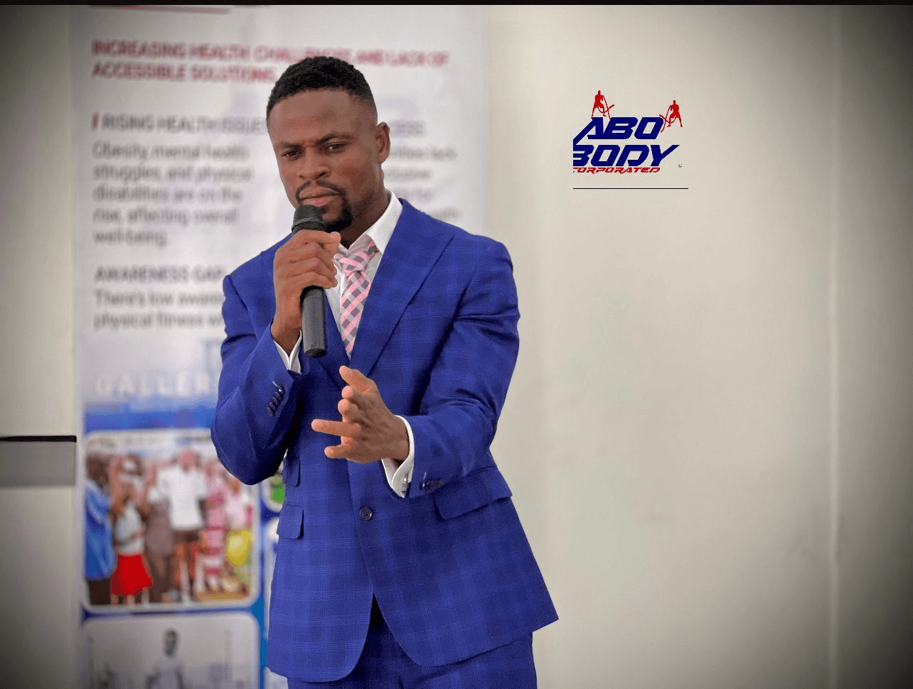 Abel Gebor speaking at an ABO BODY event